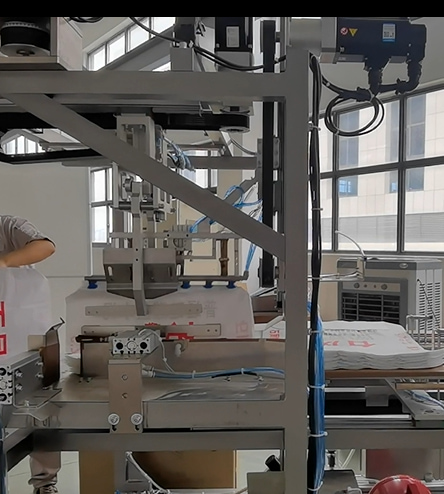 Automatic PP woven valve bag insertion machine manufacturing plant cost Automatic PP woven valve bag insertion machine manufacturing plant cost